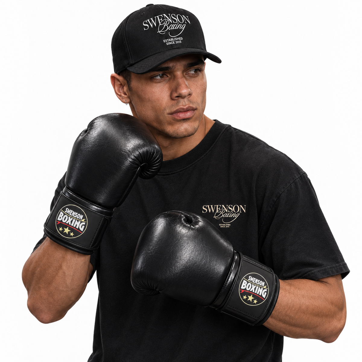 Male model wearing black Swenson Boxing gloves