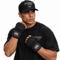 Male model wearing black Swenson Boxing mesh quick wraps