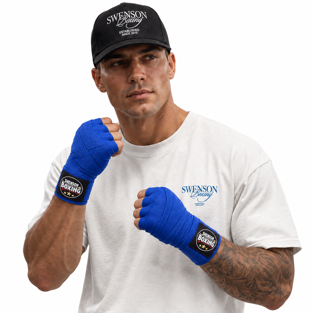 Male model wearing blue Swenson Boxing traditional hand wraps