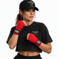 Female model wearing red Swenson Boxing traditional hand wraps